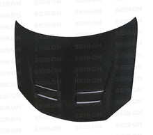 Load image into Gallery viewer, Seibon Carbon HD0607VWGTIB-DV DV-style Carbon Fiber Hood For 2006-2009 VW Golf GTI (Shaved)