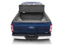 Load image into Gallery viewer, 21-26 F-150 RealTruck UnderCover Ultra Flex Hard Folding Tonneau Cover - 5.5 ft Bed